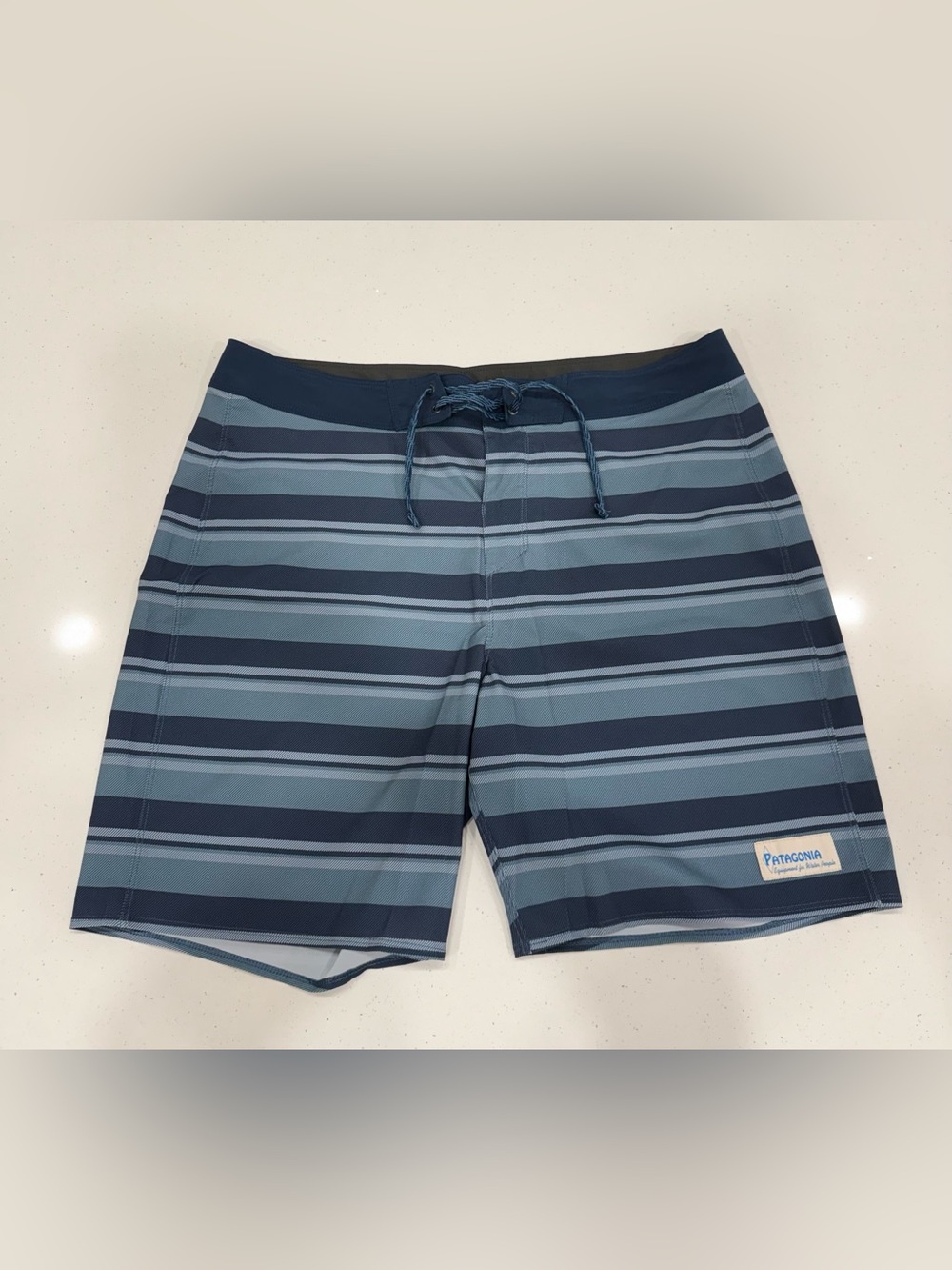 Patagonia Navy and Light Blue Striped Men’s Swim Board Shorts